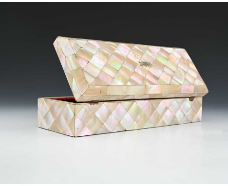 A mother-of-pearl glove box, mid-19th Century, of sarcophagus form, white metal plaque, and escutcheon, red velvet lined inte