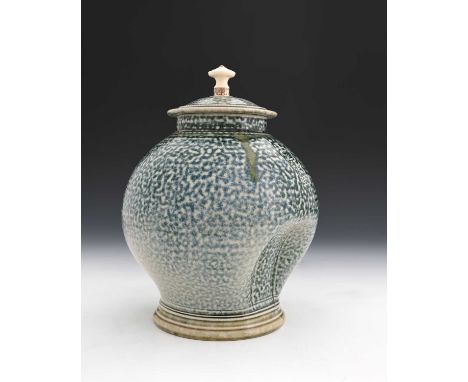 Steve Harrison, a large studio pottery salt glazed stoneware jar and cover, 2001, footed ovoid form with impressed dimple sid