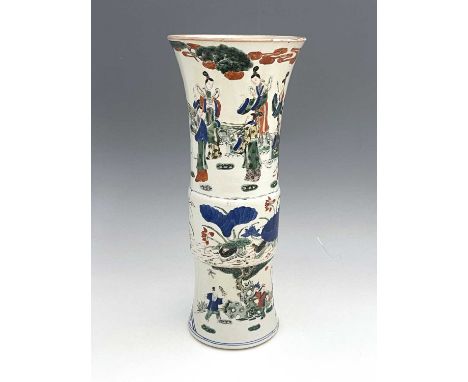A Chinese Doucai Gu vase, cylindrical flared form, painted in the round with three bands, scholarly figures in a garden lands