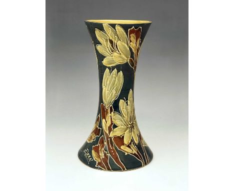 Dean for Thomas Forester and Sons, an Art Pottery slip decorated vase, circa 1910, waisted form, decorated with magnolia flow