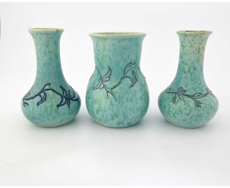 Ruskin Pottery, three tubelined Crystalline glazed vases, circa 1932, including a near pair of bulbous bottle form vases and 