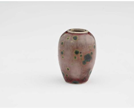 Ruskin Pottery, a miniature High Fired vase, circa 1920s, shouldered ovoid form, green oxide speckled over lavender tinted sa