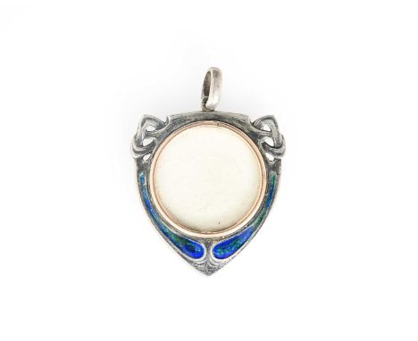 Archibald Knox for Liberty and Co., an Arts and Crafts silver and enamelled locket pendant, shield form with knotted tendril 