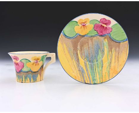 Clarice Cliff, a Delicia Pansy cup and saucer