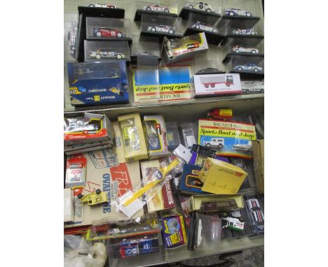 A mixed lot to include boxed and loose toy cars, together with a vintage Globe Trotter case 