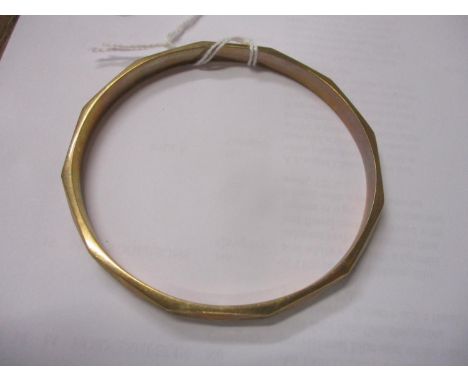 A 9ct gold floral engraved bangle, 15g 