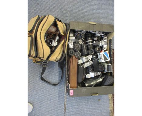 A vintage Pentax Asahi camera and accessories in a travel case, together with mixed lenses and cameras 