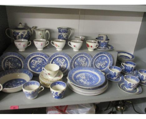 Teaware to include mainly blue and white Willow pattern ceramics, a Sadler teapot, dinner plates, jugs, teacups, saucers and 