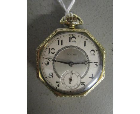 An Elgin gold plated octagonal cased American pocket watch, having a silvered dial marked Solar with Arabic numerals and off 