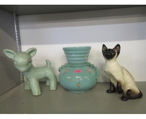 A ceramic model of a Winstanley seated cat, a Denby pottery of a large lamb in a pale blue/green glaze and an Italian art pot