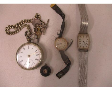 A nickel plated pocket watch, a Valentine watch, a 9ct gold wristwatch and a miniature compass 