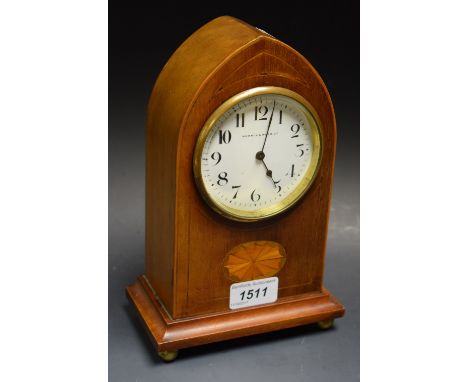 An Edwardian mahogany inlaid mantel clock, lancet top, Mappin and Webb