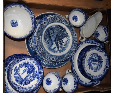 An early 19th century blue and white transfer printed tea set, decorated with Pagoda landscapes, comprising slop bowl, four t