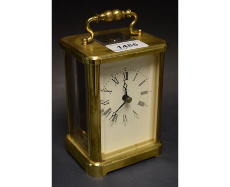 A large brass English carriage clock