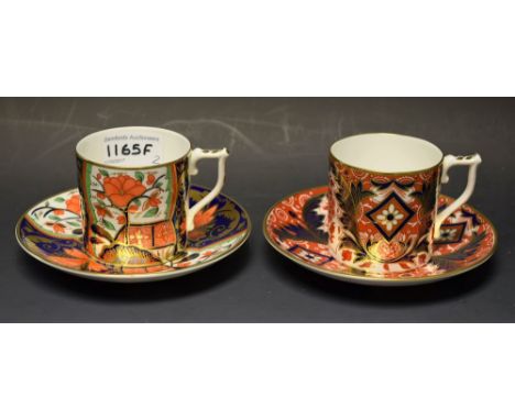 Two Royal Crown Derby coffee cans and saucers