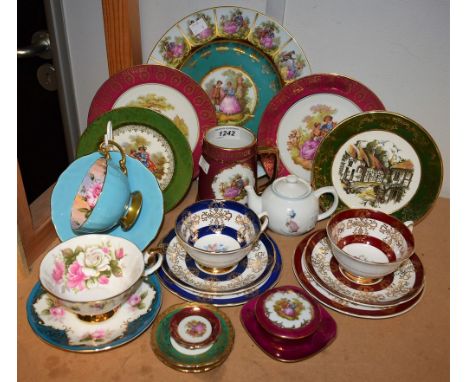 An Aynsley teacup and saucer the interior printed with pink flowers; two Royal Grafton teacups, saucers and tea plates;  Limo