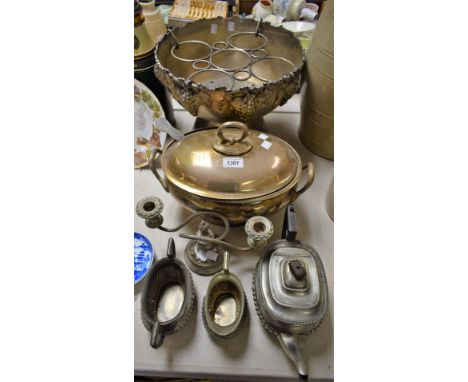 A large EPNS punch bowl; an Epns soup tureen with ladle; a table candlestick; a three piece tea service