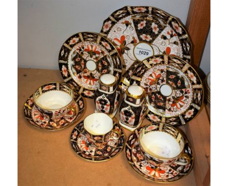 A pair of Royal Crown Derby 2451 pattern cups, saucers and side plates; others, coffee can and saucer, etc; a pair of 1128 pa