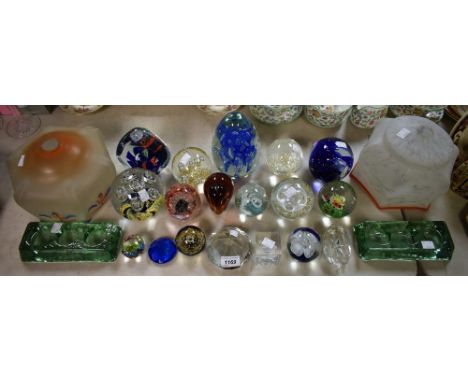 A frosted glass lamp shade; another; a large glass dump type paperweight with inclusions; other assorted glass paperweights; 