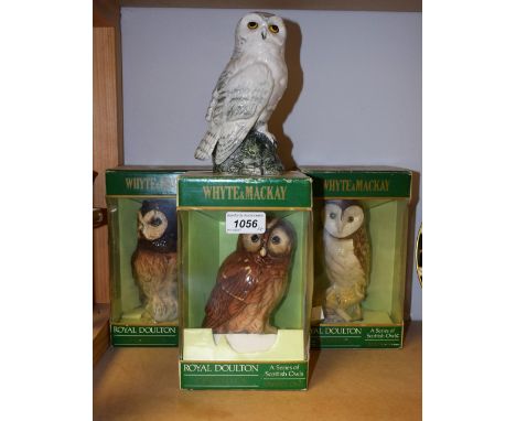 A Royal Doulton ceramic decanter as an owl, barn Owl, Tawny Owl, Short Eared Owl,Snowy Owl, three boxed, no contents (4) 