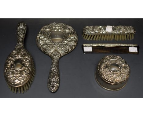 Silver  - a Victorian style dressing table set, inc circular lidded box, mirror, brush, comb etc, Birmingham 1977 (5)