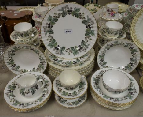 A Royal Worcester Lavina pattern part dinner and tea service comprising dinner plates, salad plates, side plates, cups and sa