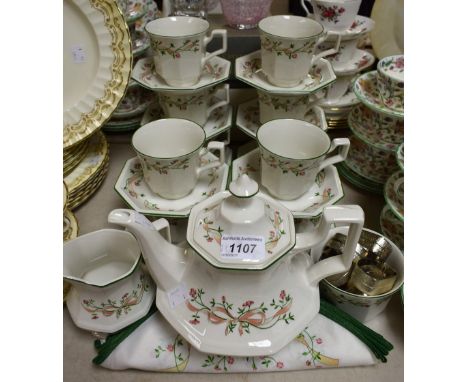 Ceramics - an Eternal Beau tea set, comprising teapot, ten cups and saucers, sugar bowl, milk jug; a set of eight napkin ring