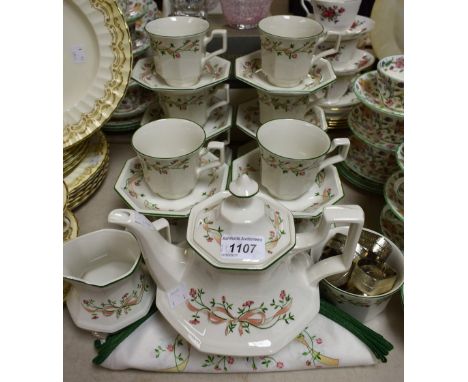 Ceramics - an Eternal Beau tea set, comprising teapot, ten cups and saucers, sugar bowl, milk jug; a set of eight napkin ring