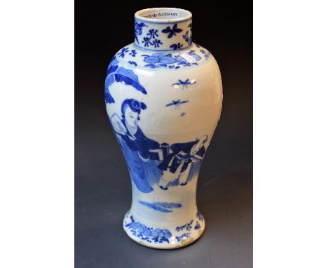 A 19th century Chinese inverted baluster vase, decorated in underglaze blue with lady holding a fan and child, by a palm tree