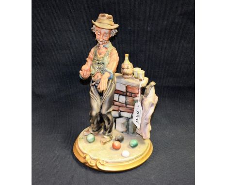 A Naples Capodimonte figure, Playing Bowls