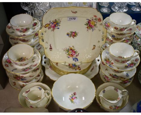 A late 19th/ early 20th century Coalport part tea set comprising cake plates, side plates, cream jugs, sugar basin, cups and 