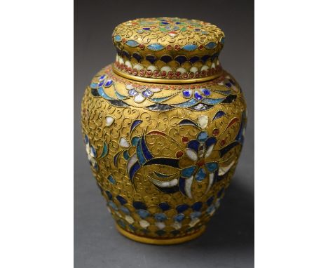 A 19th century Chinese cloisonné enamel and gilt-metal ovoid ginger jar and cover, of small proportions, sparsely decorated w