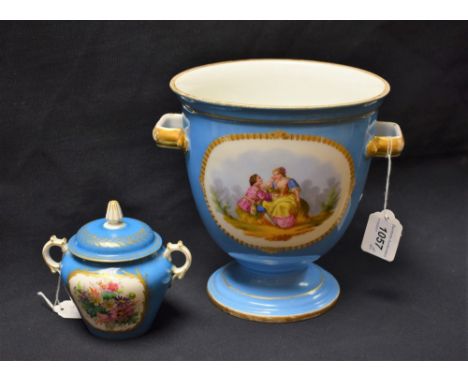 A 19th Century French two handled ice pail, painted with gilt oval cartouches of courting  couples in period dress, on a bleu