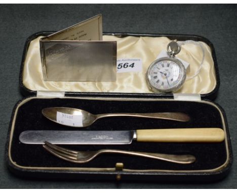 A silver lady's pocket watch; a chrome stamp case; a silver baby's fork and spoon, Sheffield