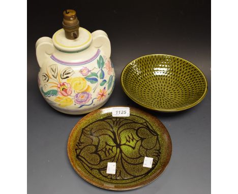 A Poole amphora twin handled table lamp, impressed marks; a Poole circular dessert plate, glazed in tea green; another, simil