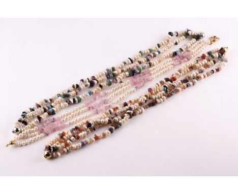 A three-strand freshwater pearl and rose quartz necklace to an oversized gilt metal bolt ring clasp. 48cm length; together wi