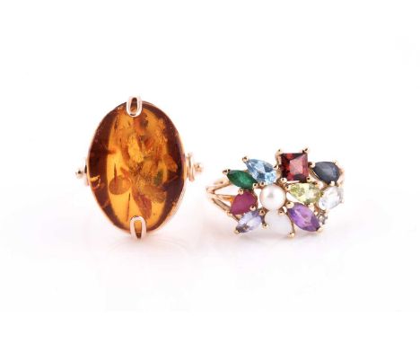 A 9ct yellow gold and multi-gem ring, set with a pearl, opal, amethyst, ruby, garnet, emerald, topaz, aquamarine, citrine, an