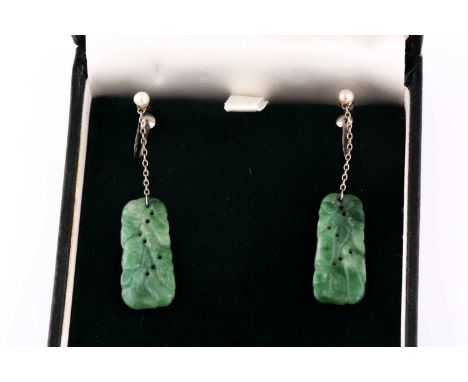 A pair of 18ct white gold and jade drop earrings, each with a white gold mount set with a pearl, suspended with a chain and a
