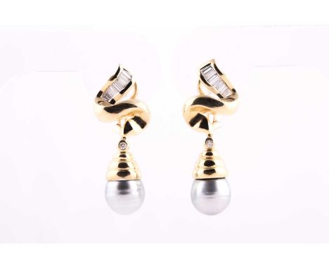 A pair of yellow metal, diamond, and grey pearl earrings, each ribbon-twist mount channel-set with calibre-set baguette-cut d