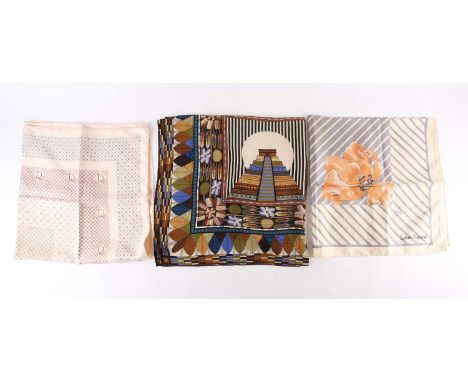 A Christian Dior silk scarf together with a Louis Feraud silk scarf and another T &amp; J Vestor silk scarf. (3)Condition rep