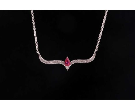 A ruby and diamond necklace; the fixed scroll shaped centre set with graduated round brilliant cut diamonds and a single ston