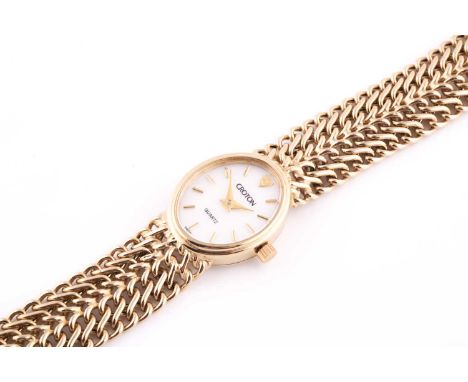 A yellow metal ladies Croton watch, the mother-of-pearl dial with baton marker, on articulated fancy-link strap, the case mar