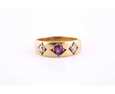 An 18ct yellow gold, diamond, and ruby ring, with bright-cut set ruby, and two old-cut diamonds, size M.Condition report: 5.2