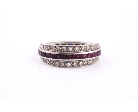 A diamond, sapphire, and ruby hinged eternity ring, the hoop set with calibre-cut rubies and sapphires, with two hinged segme
