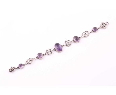 An Arts &amp; Crafts silver and amethyst bracelet by Arthur and Georgie Gaskin, circa 1910, set with five graduated amethyst 