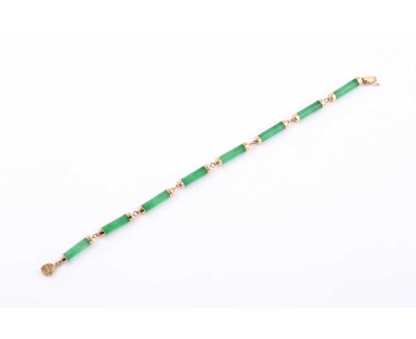 A 14ct yellow gold and jade bracelet, the smooth baton links with yellow metal terminal mounts, the clasp marked 14k, 18 cm l