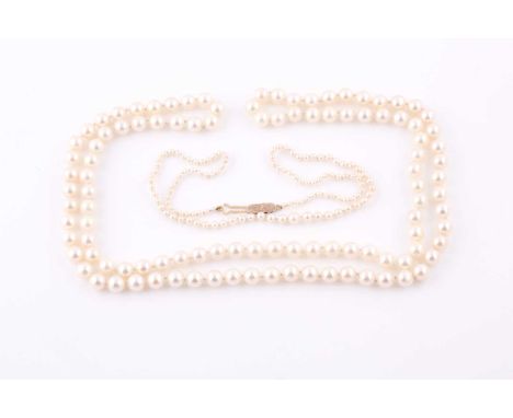 A graduated pearl necklace, the pearls ranging from 2.5 - 5.3 mm diameter, approximately 37 cm long, fastened with a 9ct clas