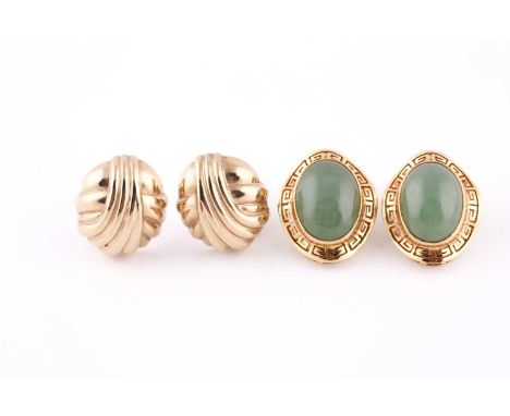 A pair of 18ct yellow gold and jade earrings, set with oval cabochon green jade, within a Greek key patterned border, earring