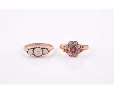 A rose gold and opal ring, set with three round cabochon opals, shank unmarked, size N, 2.2 grams, together with a rose gold,