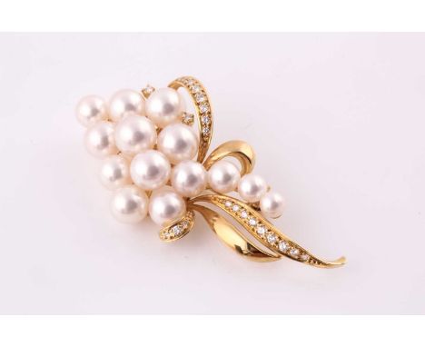 Mikimoto. A gold, diamond and pearl brooch; the stylised spray formed from fourteen vari-sized cultured pearls set between ro